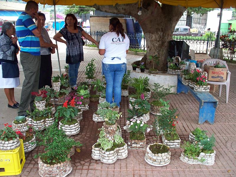 100_2606.jpg - Ataco town square vendors...  Mario liked these planters and wondered to himself if he could start a hobby making something similar.