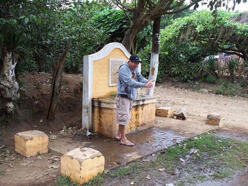 100_2654.jpg - This is a faucet provided to residents for water.  We saw various people bringing their water jugs here to be filled.