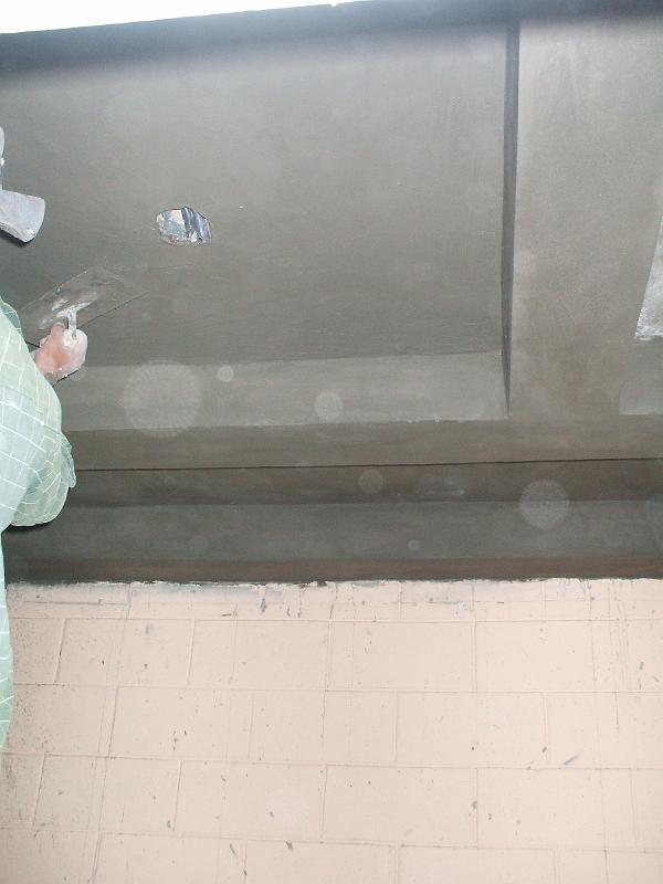 DSCF2113.JPG - You can see the worker doing the finishing ceiling work.